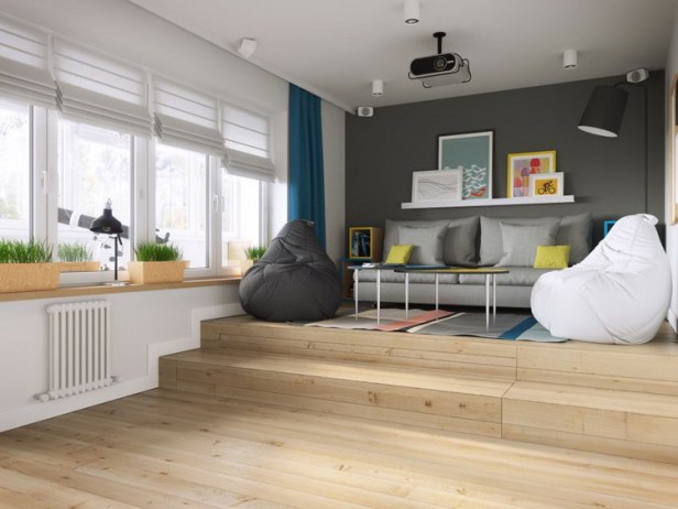 
Phòng khách được thiết kế đặc biệt với sàn gỗ được nâng cao hai bậc. Đây cũng chính là không gian nghỉ ngơi lý tưởng của chủ nhà với chiếc giường được “giấu” bên dưới.

 
