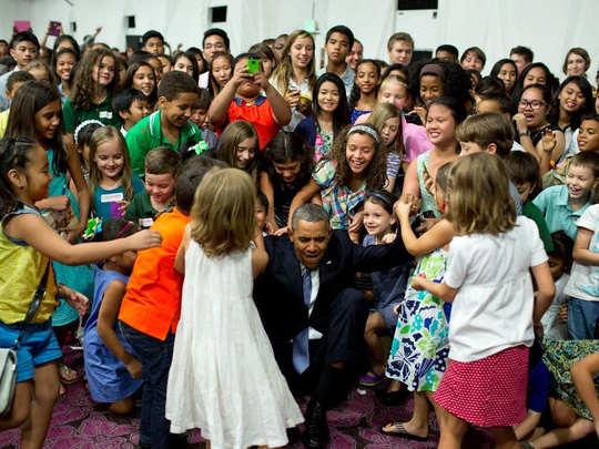 
Ông Obama rất được lòng trẻ con. Ảnh: Nhà Trắng
