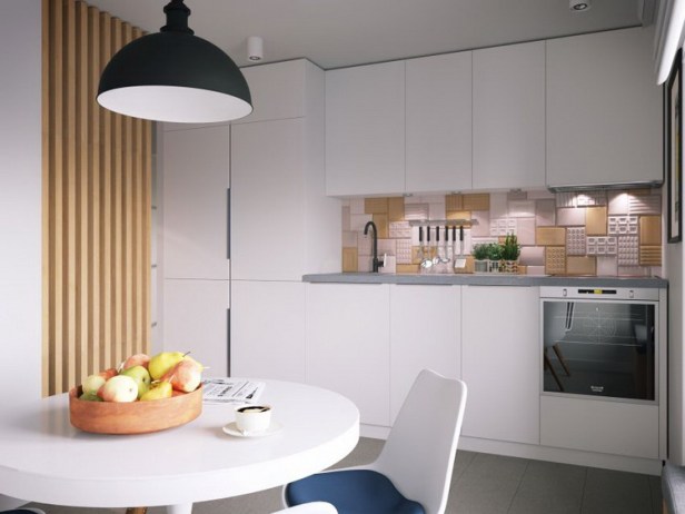 
Khu vực bếp được thiết kế đơn giản với hệ tủ kệ màu trắng cùng tông màu với chiếc bàn ăn tròn tạo nên một không gian thoáng sáng và sạch sẽ.

 
