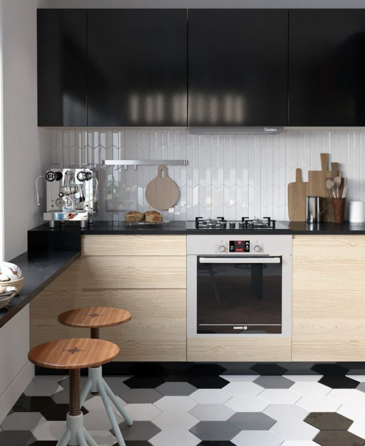 Tất cả mọi thứ nơi góc nhỏ này được bố trí gọn gàng ngăn nắp. Hệ thống tủ kệ kín chạy dọc tường bên trên và phía dươi bếp ga thỏa mãn nhu cầu trữ đồ của chủ nhà.