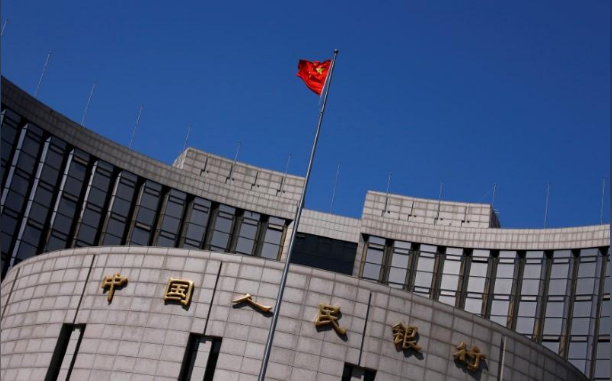 Trung Quốc theo chân Fed, tăng lãi lần đầu tiên trong năm nay - Ảnh 1.