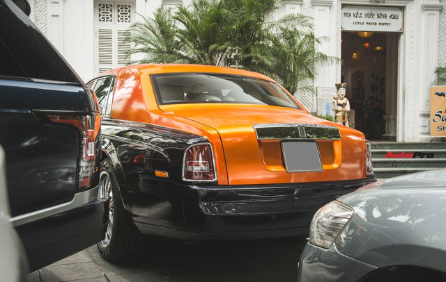 Chiếc Rolls-Royce Phantom tại Hà Nội đổi màu nhanh như tắc kè: Vừa hết tím mộng mơ lại đến cam cá tính - Ảnh 7.