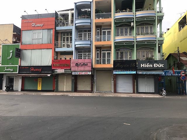 Đường phố Sài Gòn dịu dàng sáng mùng 1 Tết - Ảnh 11.