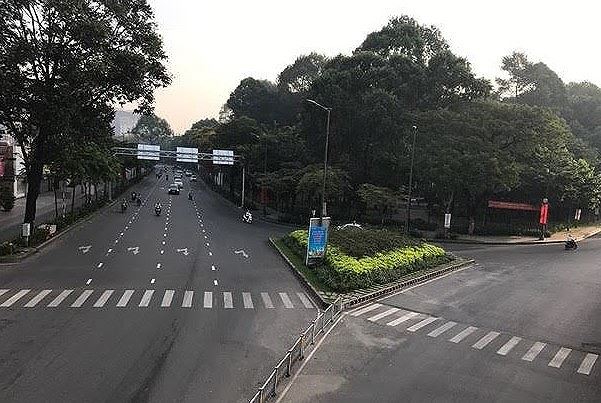 Đường phố Sài Gòn dịu dàng sáng mùng 1 Tết - Ảnh 8.