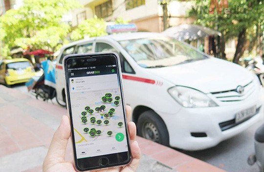 Hiệp hội Taxi tiếp tục đấu căng với Grab - Ảnh 1.