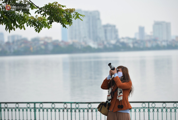 Ảnh: Người Hà Nội trở lại cuộc sống nhộn nhịp trong cuối tuần đầu tiên nới lỏng giãn cách xã hội - Ảnh 13.