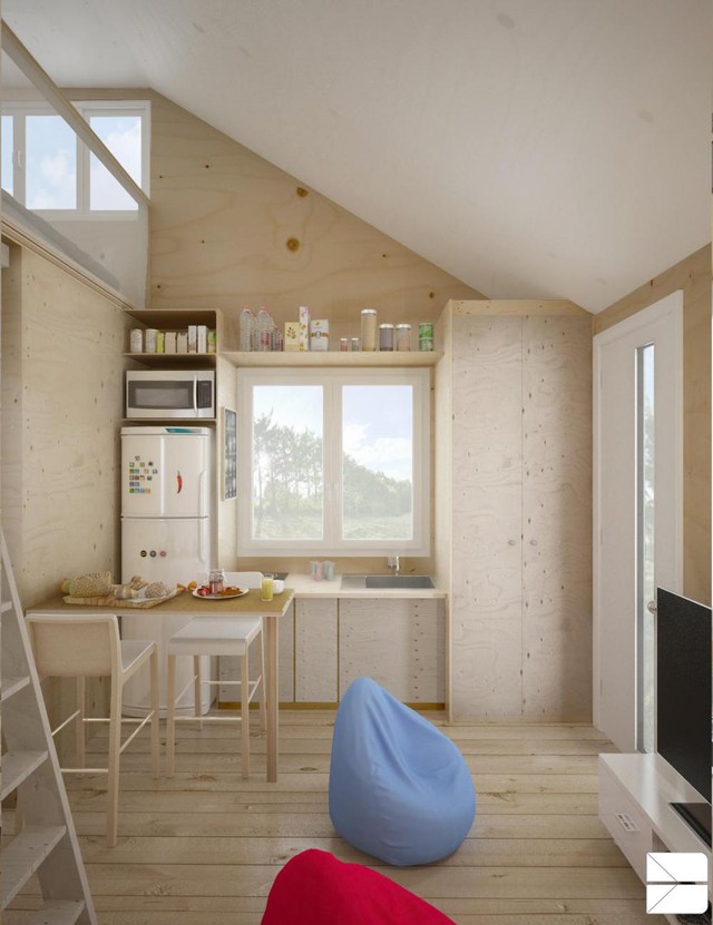 
Phòng khách xinh xắn được đặt ngay cạnh bếp ăn nhỏ mang phong cách tối giản với hai chiếc gối lười bắt mắt. Nhờ sử dụng toàn bộ nội thất bằng gỗ sáng màu khiến không gian trong căn nhà nhỏ bé này thêm thoáng rộng hơn diện tích thực.

