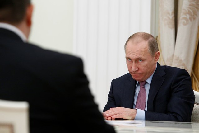 Tổng thống Nga Vladimir Putin trong cuộc gặp với Thủ tướng Thổ Nhĩ Kỳ Binali Yildirim tại Điện Kremlin hôm 6/12. Ảnh: AFP.
