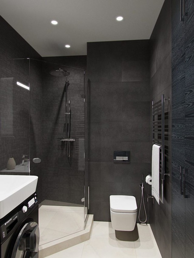 
Trái ngược với không gian nhiều màu sắc bên ngoài, khu vực nhà tắm lại là sự kết hợp hài hòa của hai tông màu đen trắng tạo không gian sang trọng và sạch sẽ.

 
