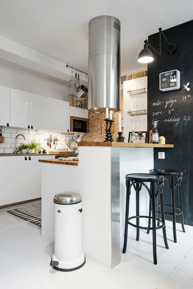 Phong cách tối giản và hiện đại cũng được sử dụng khéo léo trong cách lựa chọn nội thất nhà bếp. 