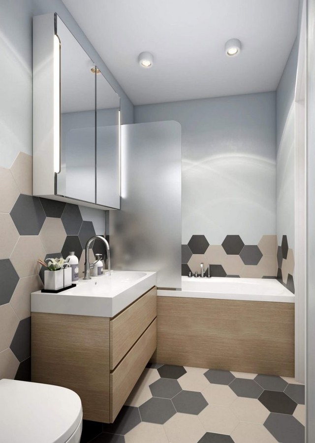 
Những hình lục giác đan xen lại một lần nữa xuất hiện trong phòng tắm mang đến không gian khác lạ và là điểm nhấn ấn tượng nơi góc nhỏ này.

 
