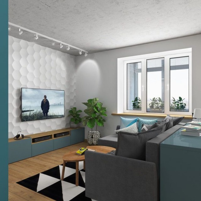 
Không gian phòng khách được thiết kế đơn giản nhẹ nhàng với cây xanh hiện hữu trong và ngoài cửa sổ.

 
