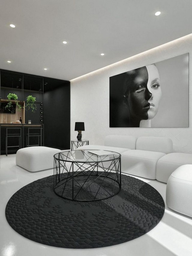 Bức chân dung lớn cũng với 2 tông màu đối lập đen- trắng thu hút mọi ánh nhìn của khách vào nhà. 