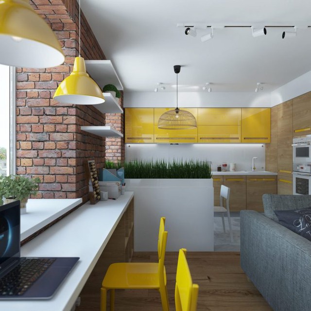 
Bức tường gạch thô nối dài từ phòng khách chạy sáng khu vực bếp ăn tạo không gian vô cùng gần gũi và ấm cúng.

 
