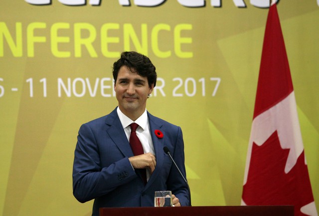 Thủ tướng điển trai Justin Trudeau và quyết tâm bảo vệ người dân Canada - Ảnh 6.