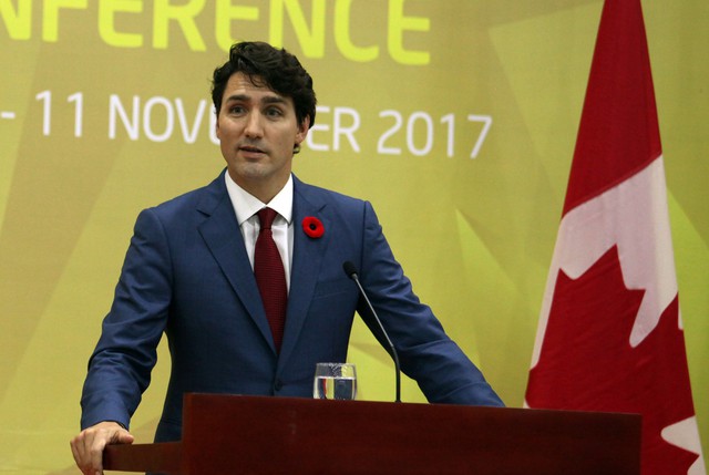 Thủ tướng điển trai Justin Trudeau và quyết tâm bảo vệ người dân Canada - Ảnh 9.