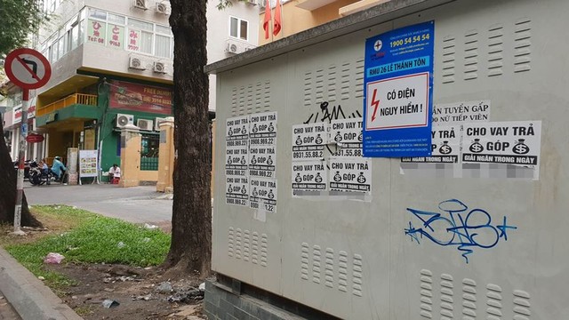 Tín dụng đen giăng bẫy khắp phố phường Sài Gòn - Ảnh 1.