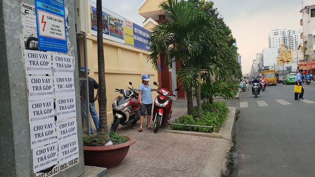 Tín dụng đen giăng bẫy khắp phố phường Sài Gòn - Ảnh 2.