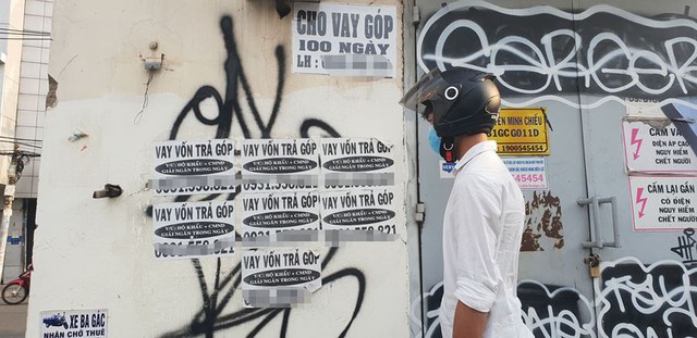 Tín dụng đen giăng bẫy khắp phố phường Sài Gòn - Ảnh 12.