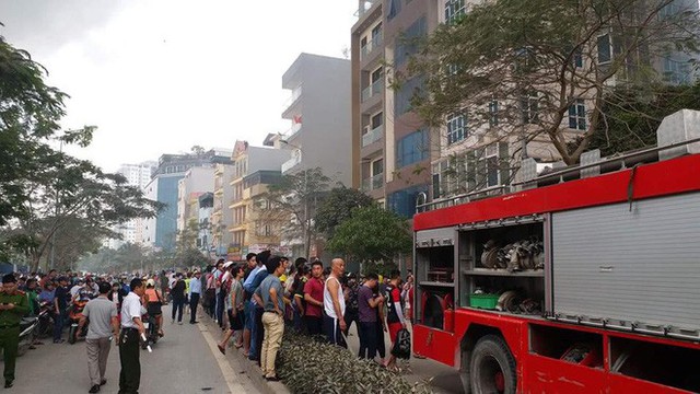 Hiện trường tan hoang vụ cháy chợ Quang ở Hà Nội - Ảnh 4.