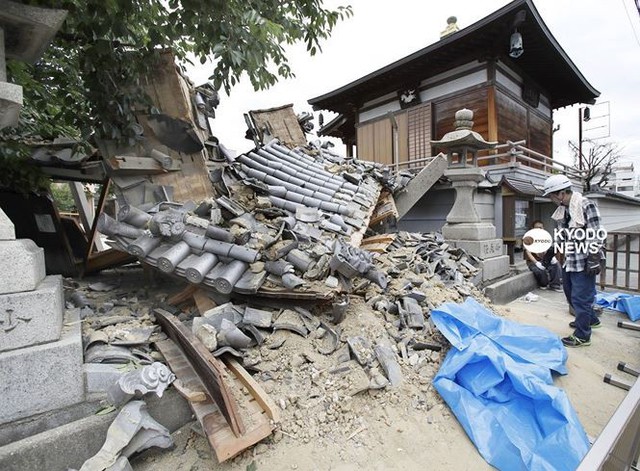 Nhật Bản tan hoang sau động đất khiến 153 người thương vong  - Ảnh 10.