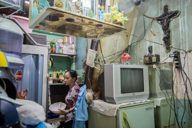 Cuộc sống trong những căn nhà siêu nhỏ ở trung tâm Sài Gòn - Ảnh 12.