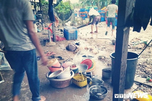 Ảnh: Người Việt thẫn thờ dọn dẹp đổ nát sau vụ vỡ đập thủy điện ở Lào - Ảnh 2.