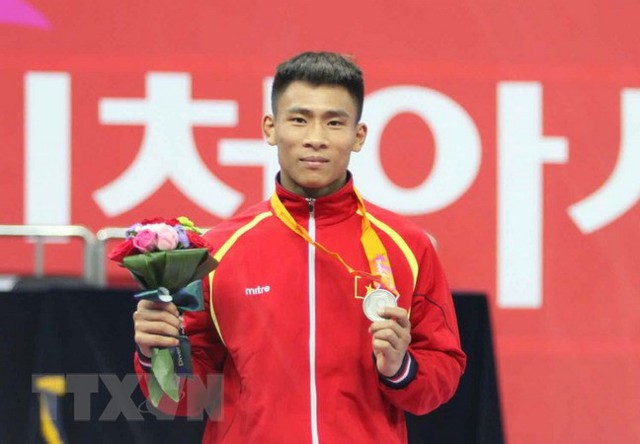 Việt Nam giành HC vàng đầu tiên tại ASIAD 2018 - Ảnh 2.