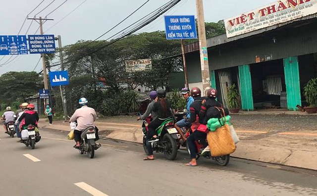 Người dân ùn ùn trở lại Sài Gòn sau lễ - Ảnh 16.