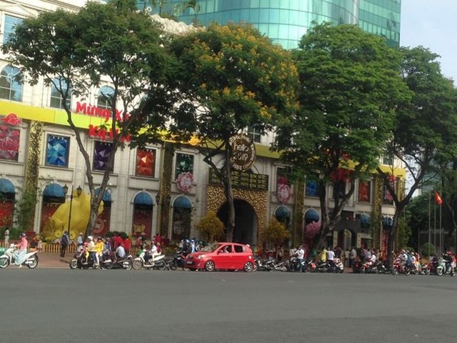 Đường phố Sài Gòn dịu dàng sáng mùng 1 Tết - Ảnh 17.