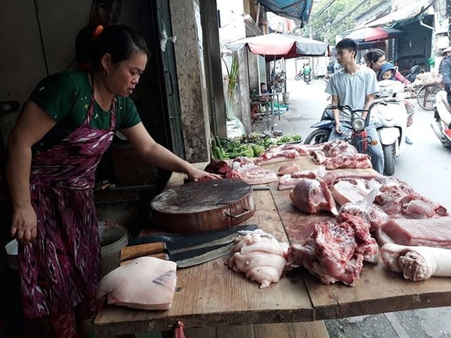 Bộ trưởng Nông nghiệp kêu gọi người tiêu dùng không quay lưng với thịt lợn - Ảnh 2.