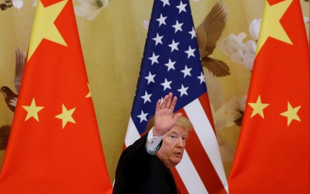 Tổng thống Trump dọa duy trì thuế nhập khẩu với hàng hóa Trung Quốc - Ảnh 1.