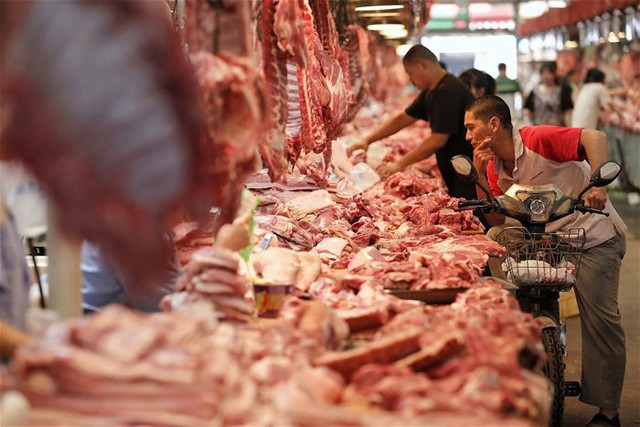 Giá thịt lợn Trung Quốc tăng cao do dịch tả lợn châu Phi  - Ảnh 1.