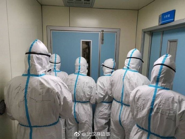 Loạt ảnh chụp đội ngũ y bác sĩ giữa ổ dịch Vũ Hán cho thấy sự hy sinh cao cả, bất chấp mạng sống để chiến đấu với virus corona - Ảnh 5.