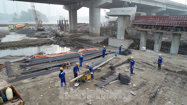 Cận cảnh công trình cầu vượt hồ Linh Đàm xóa điểm ùn tắc lớn nhất Hà Nội - Ảnh 4.