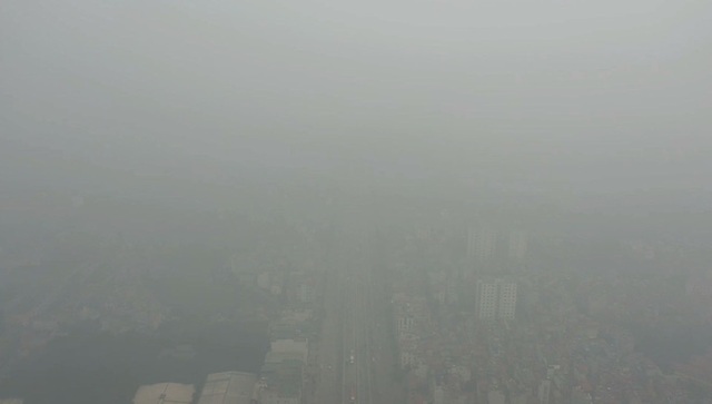  Nhiều tòa nhà mờ ảo nhìn từ flycam, chất lượng không khí ở Hà Nội suy giảm - Ảnh 6.