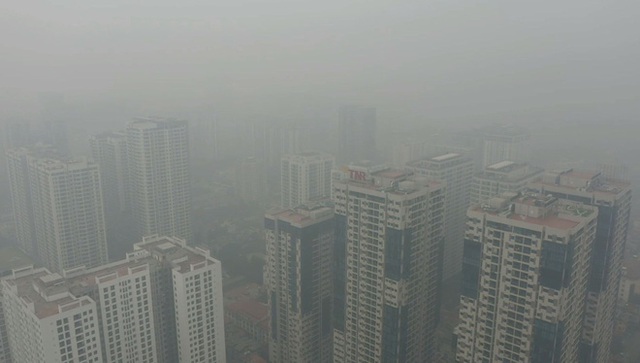 Nhiều tòa nhà mờ ảo nhìn từ flycam, chất lượng không khí ở Hà Nội suy giảm - Ảnh 7.