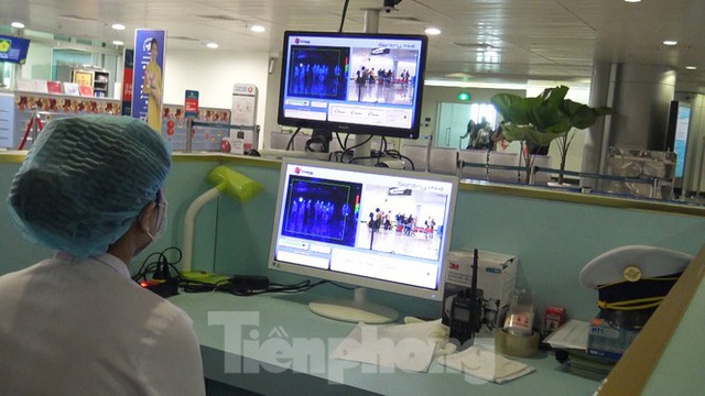 Quy trình kiểm dịch khách từ vùng dịch Hàn Quốc về sân bay Tân Sơn Nhất - Ảnh 2.