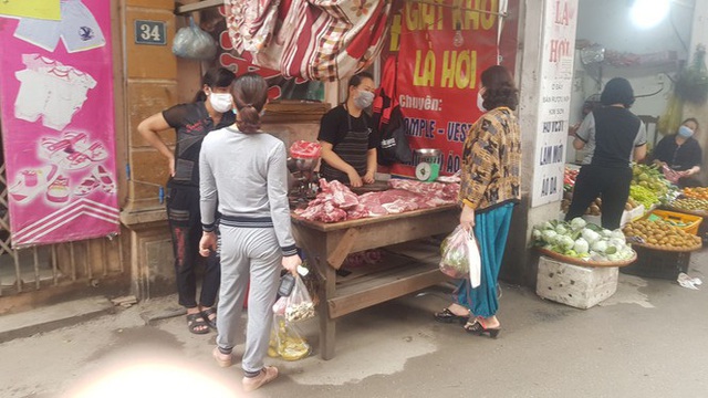 Sau chỉ đạo giảm giá, thịt lợn tại chợ truyền thống và siêu thị vẫn cao - Ảnh 2.