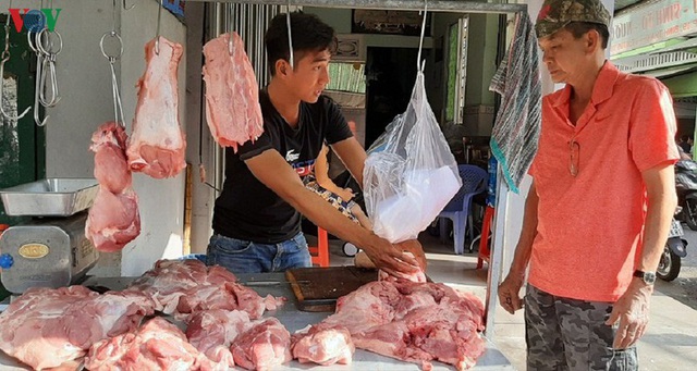 Dự kiến sẽ điều chỉnh giảm giá lợn hơi xuống mức 70.000 đồng/kg - Ảnh 1.