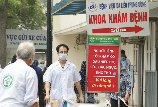 Bệnh viện ở Hà Nội đề phòng lây nhiễm COVID-19 thế nào? - Ảnh 14.