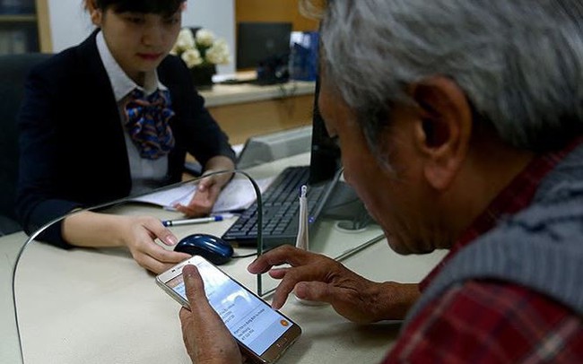 Ngân hàng cắt giảm hàng loạt phí giao dịch - ảnh 1 Ngân hàng cắt giảm hàng loạt phí giao dịch - ảnh 1