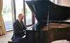 Tổng thống Putin chơi piano trong lúc đợi Chủ tịch Trung Quốc Tập Cận Bình