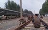 Góc nhìn lạ về cuộc sống thường ngày ở Triều Tiên bên đường ray tàu hỏa