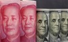 Tổng thống Mỹ cáo buộc Nga và Trung Quốc phá giá đồng tiền