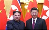 Điều ẩn chứa sau cái bắt tay lịch sử của Kim Jong-un và Tập Cận Bình