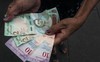 “Hậu” đổi tiền, lạm phát ở Venezuela vẫn tăng chóng mặt