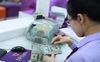 NHNN hạ mạnh giá mua USD phát đi tín hiệu gì?