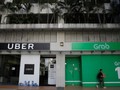 Singapore phạt Grab và Uber gần 10 triệu USD vì vụ sáp nhập