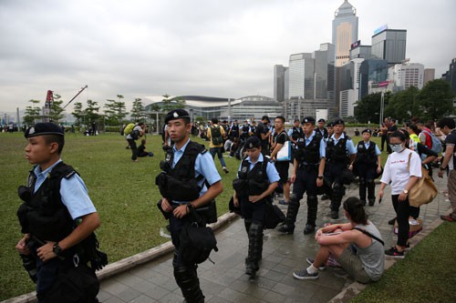 Hồng Kông treo dự luật dẫn độ sau biểu tình - Ảnh 1.